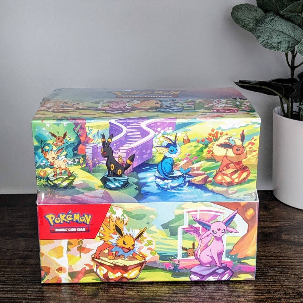 Pokemon Prismatic Evolutions Mini Tin Display Of 8 Tins Brand New Factory Sealed